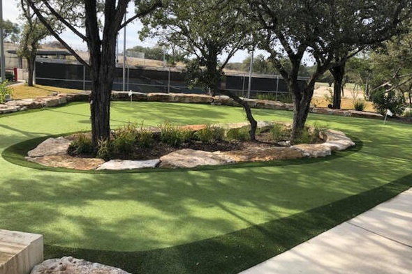 Naperville residential backyard putting green grass